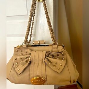 Bebe fancy tan  and gold bag never used new condition